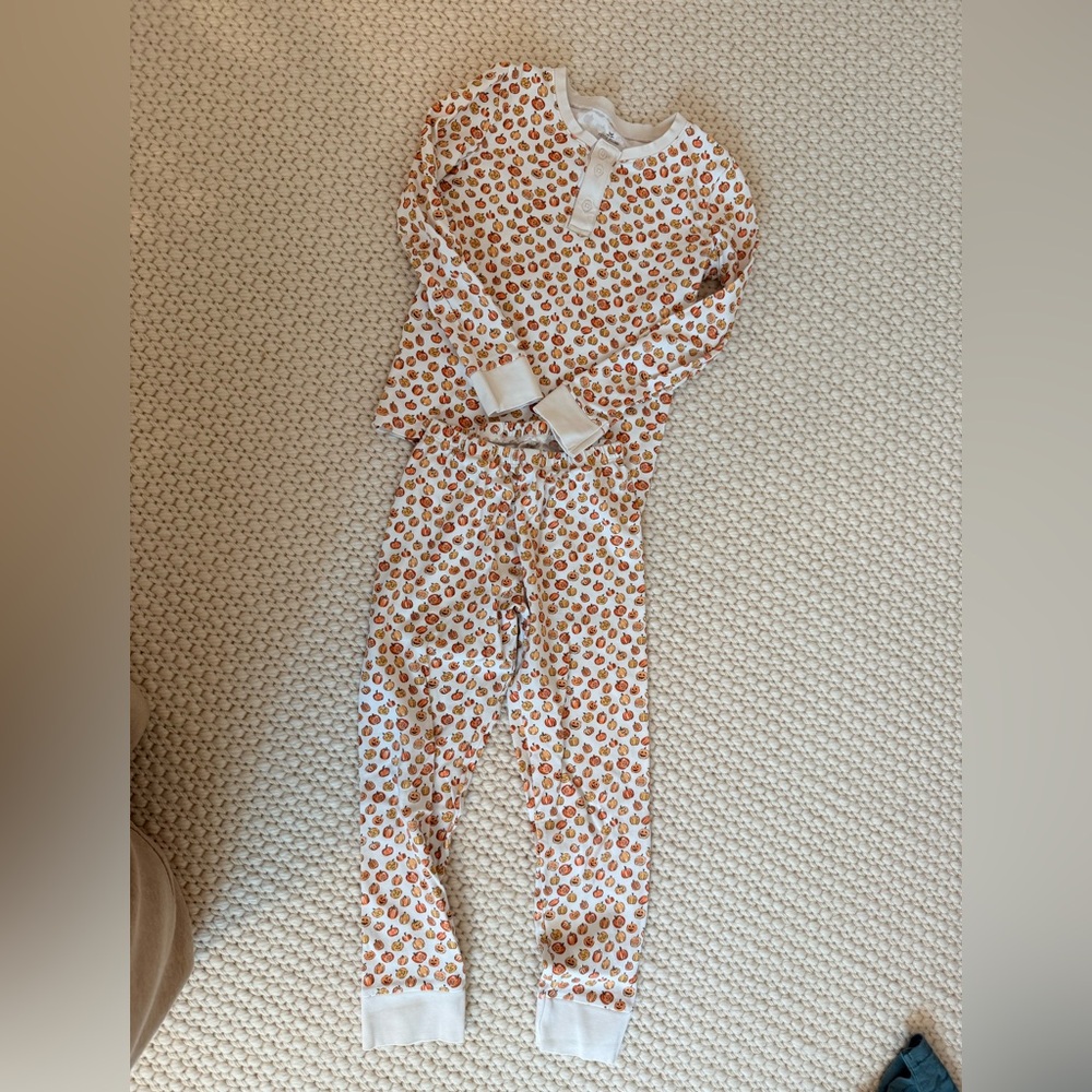 Petite Plume Kids' Two-Piece White Pajama Set with Orange Pumpkin Print